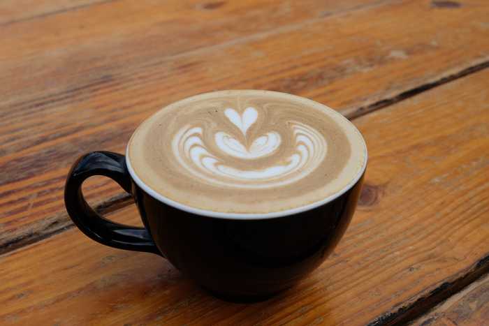 Toasted Sesame Latte with latte art of a heart